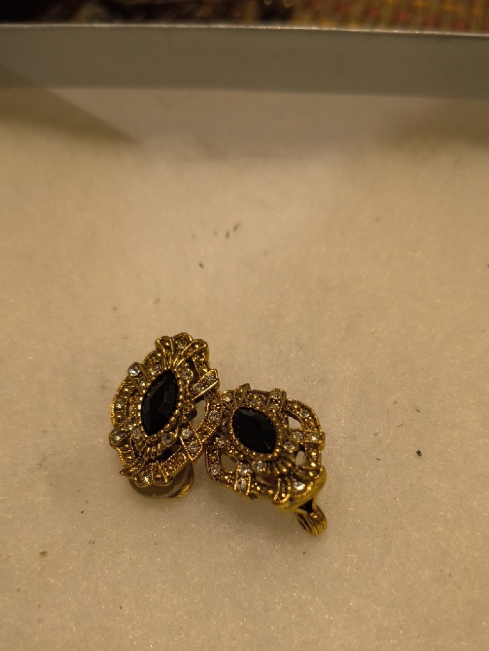 Gold-Tone Clip Earrings with Black Stone Accents